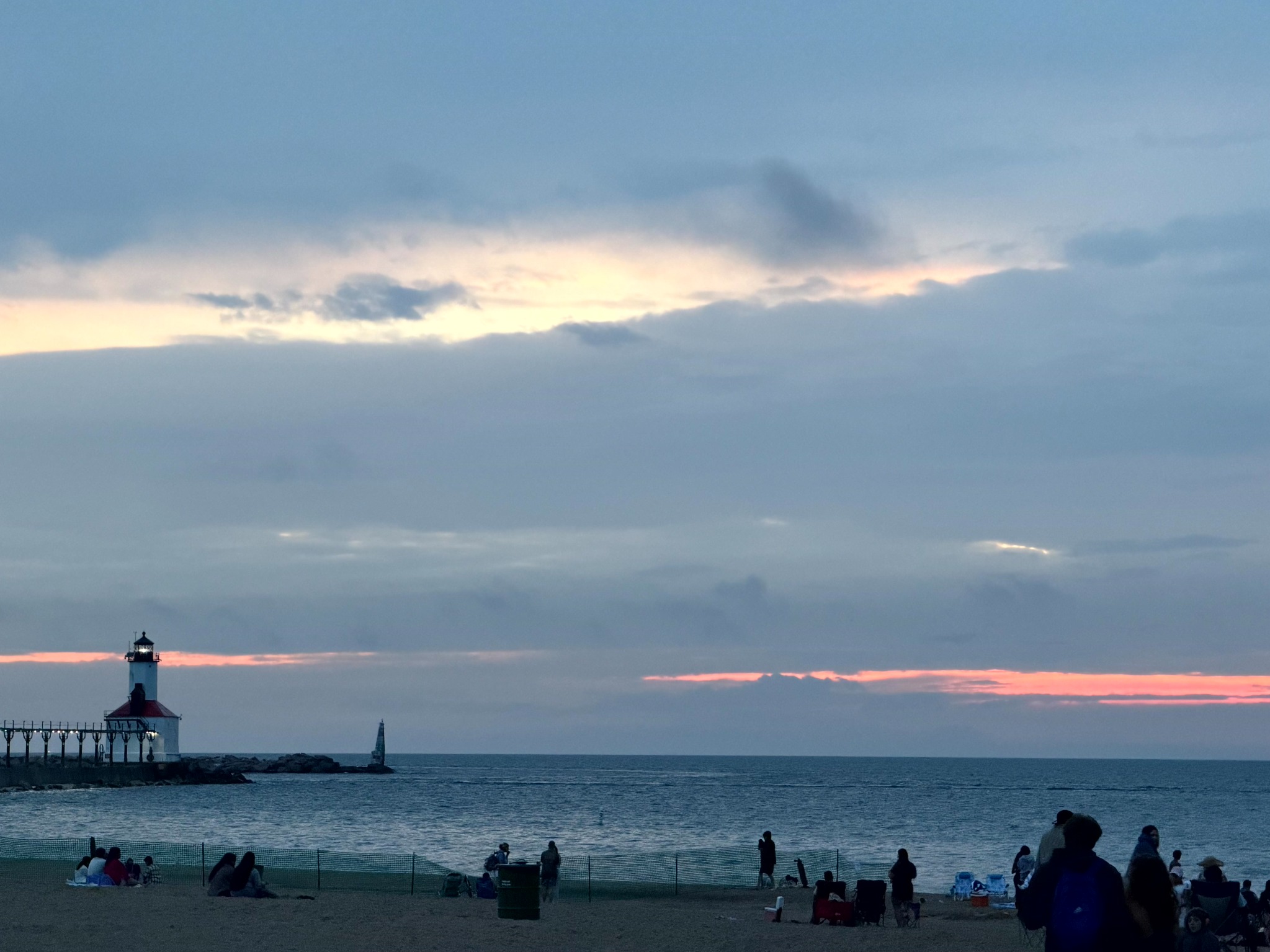 Lighthouse at the coast at sunset